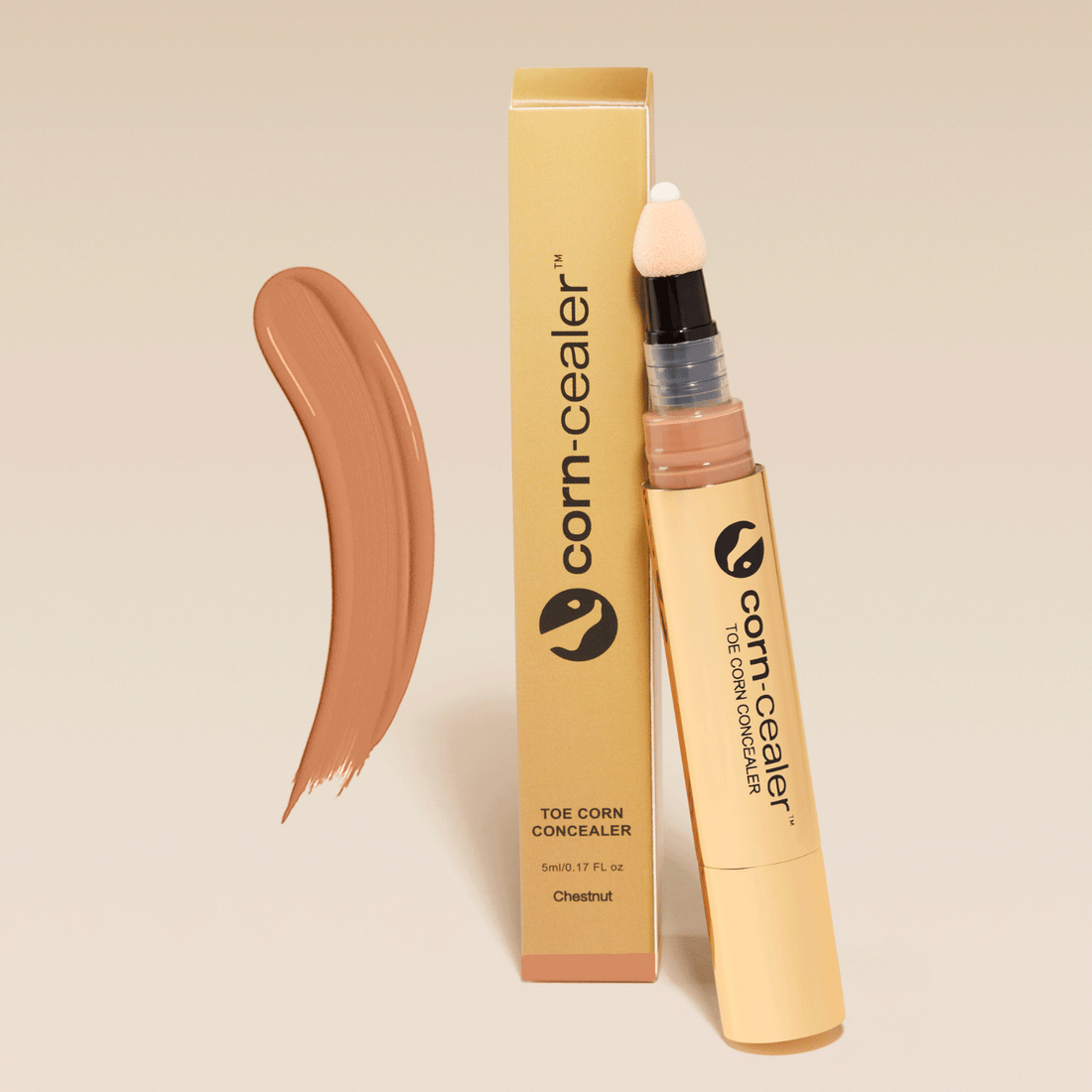 Toe Corn Concealer in Chestnut shade with applicator and packaging. Instantly covers toe corns for flawless, water-resistant coverage.